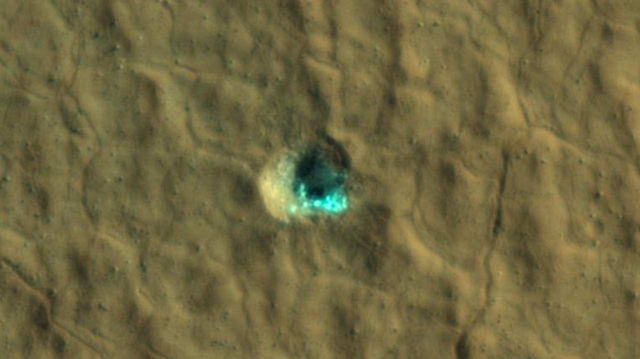 Ice-Exposing Impact Crater On Mars