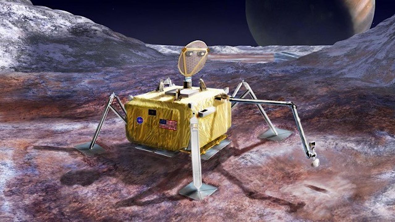 Artist’s concept image of a spacecraft lander with a robot arm on the surface of Europa. Credits: NASA/JPL – Caltech