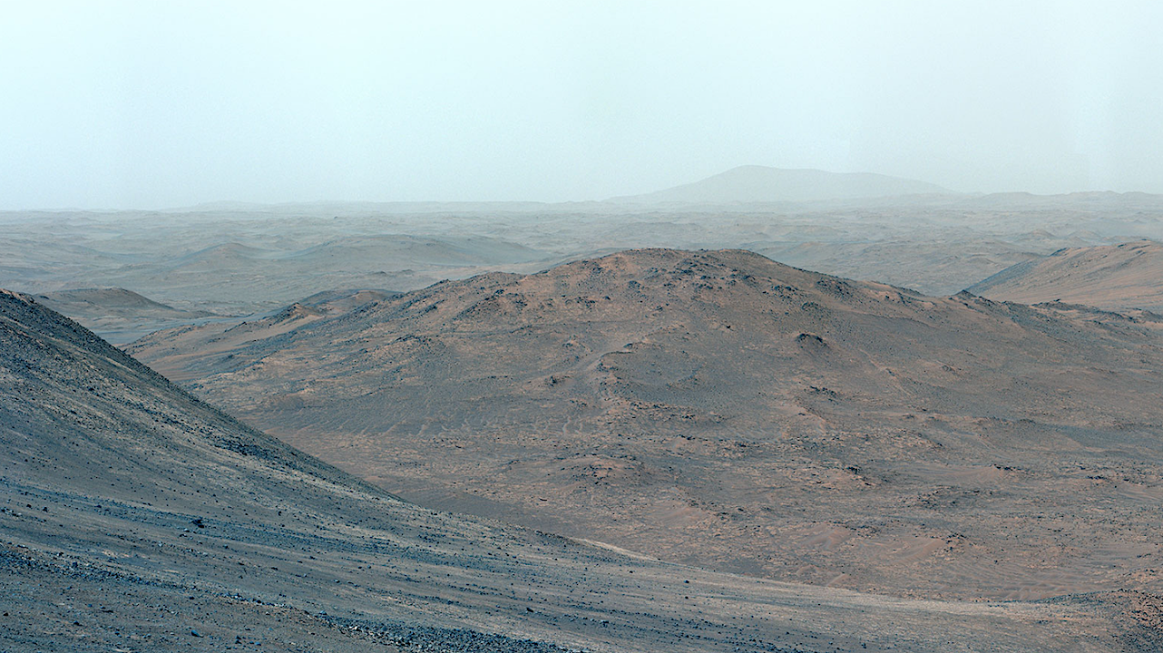 Martian surface outside of Jezero Crater taken by NASA’s Perseverance on Dec. 25, 2024, at the site where the rover cored a sample dubbed “Silver Mountain” from a rock likely formed during Mars’ earliest geologic period. Credit: NASA/JPL-Caltech/ASU/MSSS larger image